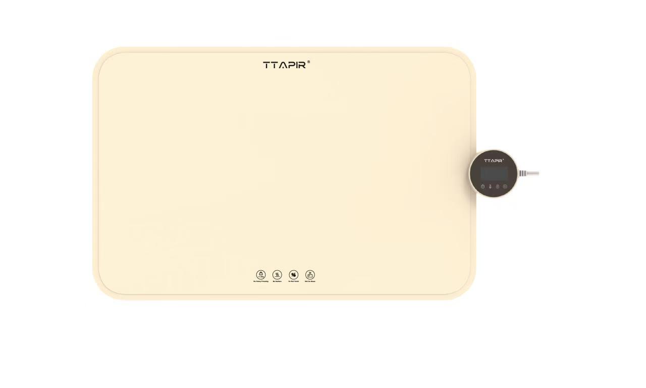 Front view of the cream food warming mat on counter